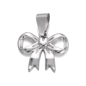 Detailed view of silver bow-shaped metal pendant charm for DIY jewelry making