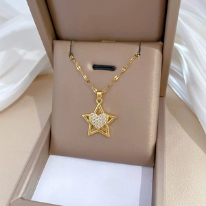 Elegant gold star and heart necklace with sparkling crystals in a premium gift box