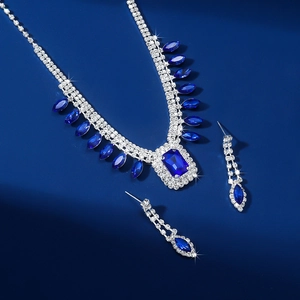Detail view of luxury blue crystal square necklace and earring set with micro-pave rhinestones