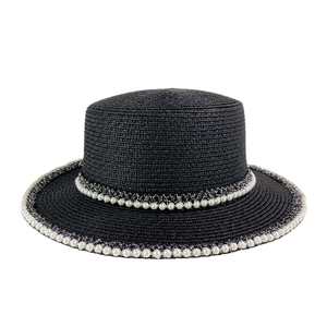 French vintage black boater straw hat with elegant white pearl lace trim for beach sun protection