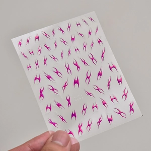 Macro detail of ta-351 metallic pink flame nail stickers with starlight laser texture