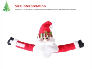 Close-up of plush Santa Claus curtain buckle with hook and loop fastener detail