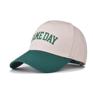 Close-up of cotton baseball cap with two-tone design and GAME DAY printed text