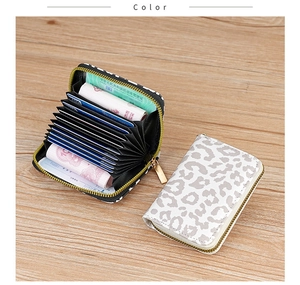 Detail of accordion card wallet with leopard print and eleven internal card slots