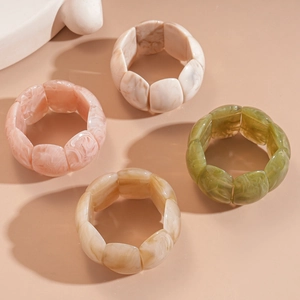 Acrylic chunky stretch bracelet with marble texture in pink, cream, and olive green