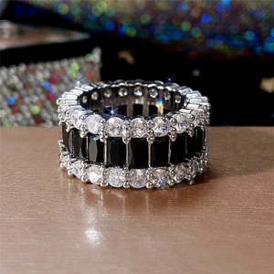 Three-row sterling silver ring with black rectangular stones and round white zircons
