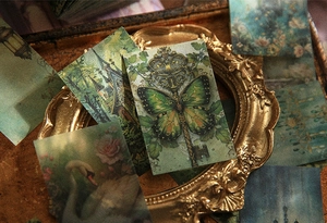 Detailed view of vintage paper scraps with butterfly key and gothic castle illustrations