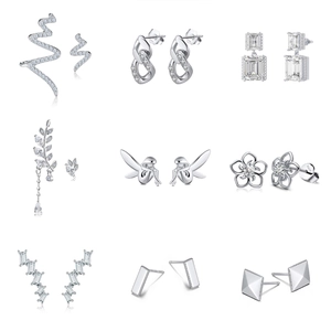 Collection of nine S925 sterling silver earrings with zircons in a 3x3 grid display