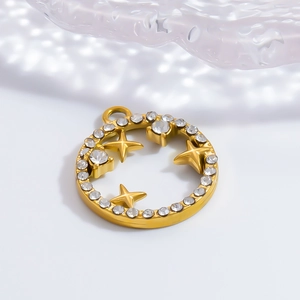 Gold round pendant with hollow stars and sparkling cubic zirconia stones on white background