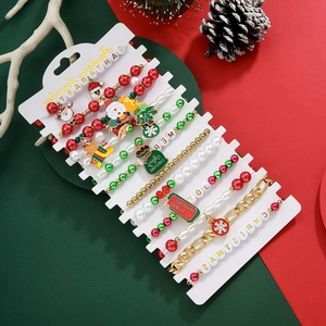 Detailed view of 12pcs Christmas bracelet set with Santa Claus and snowflake charms