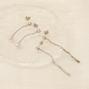 Silver stainless steel tassel earrings with heart and bar pendants and clear crystals