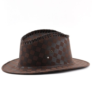 Detail of brown checkered cowboy hat featuring metal air vents and thick stitching
