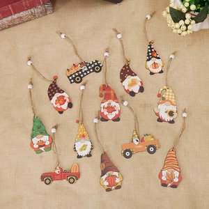 Set of 12 wooden Thanksgiving gnome ornaments featuring pumpkins and sunflowers on burlap