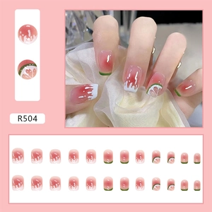 Detail of pink gradient press-on nails with lemon and watermelon fruit slices R504