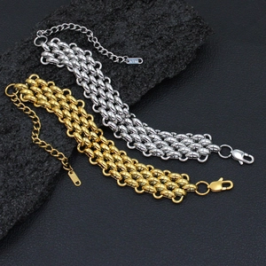 Close-up of triple-layered K18 plated stainless steel chain bracelet with lobster clasp