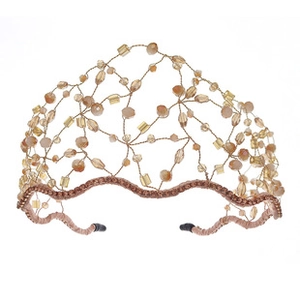 Detail of vintage champagne gold beaded mesh headband with intricate pearl embellishments