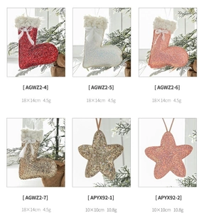 Glittering Christmas ornaments set showing boots and stars in various colors and sizes
