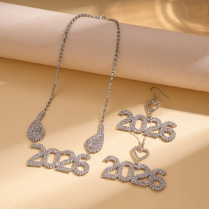 Detailed view of silver 2025 pendant necklace and earrings set with sparkling rhinestones
