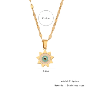 Detail of stainless steel evil eye pendant with 41+6cm chain length and 1.2cm diameter