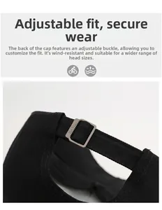 Detail of black cotton baseball cap showing adjustable silver metal buckle at the back