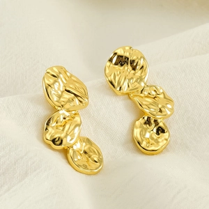 French vintage gold irregular petal fold earrings in textured lava stainless steel design