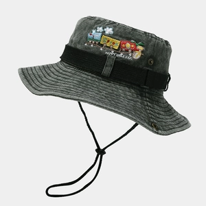 Detail of cartoon train embroidery and Happy Smile Kids text on grey bucket hat