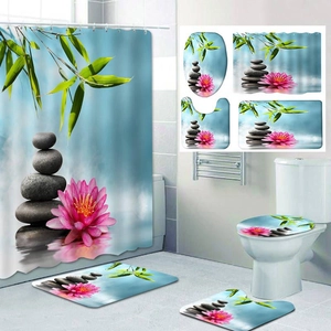 Detail of zen bathroom set showing bamboo and lotus print on curtain and non-slip mats