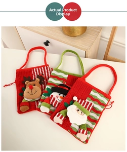 Detailed view of Christmas gift bags featuring 3D cartoon reindeer and snowman designs