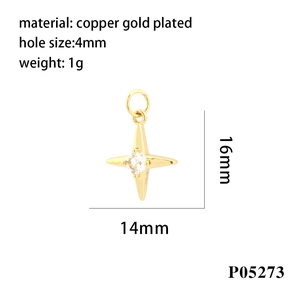 Macro detail of 16x14mm gold-plated copper cross pendant with cubic zirconia and size specs
