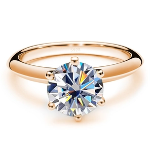 Close-up of six-prong rose gold ring featuring S925 hallmark and sparkling round gem