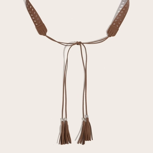 Vintage brown PU leather belt featuring hollow rings and dual tassel decorations