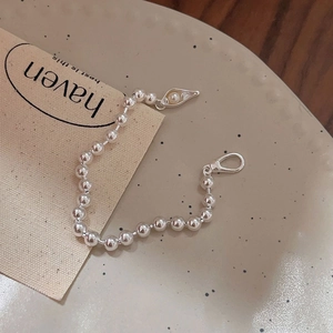 Minimalist 925 sterling silver beaded bracelet with a delicate pearl drop pendant charm