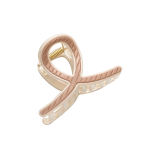 Minimalist beige striped hair claw clip with gold spring on a white background