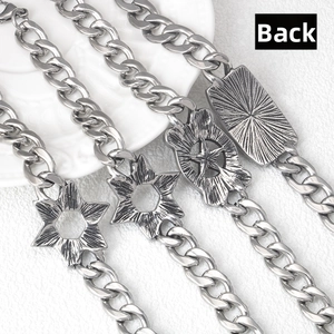Detail view showing the back of silver star punk bracelets with heavy link chains