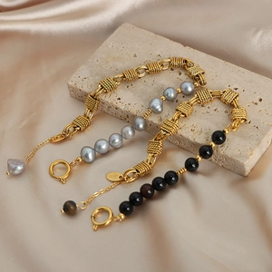 Baroque pearl and black stone bead chain bracelet with gold-plated knots on silk