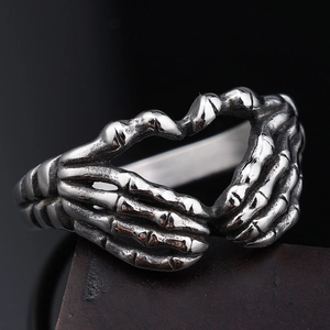 Gothic vintage silver heart skull hand ring for women made of stainless steel