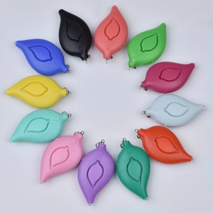 Bird-shaped personal safety alarms in multiple colors arranged in a circle with keychains