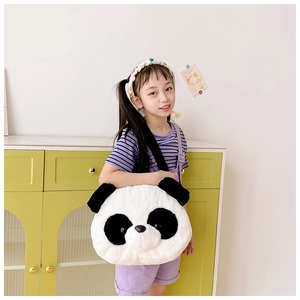 Detail shot of a soft plush panda shoulder bag showing the fuzzy texture and 3D design