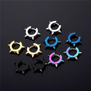 Punk style stainless steel rivet hoop earrings in five metallic colors on black background