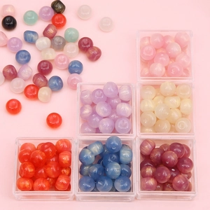 Sparkly resin star beads in assorted colors and transparent box for DIY jewelry making