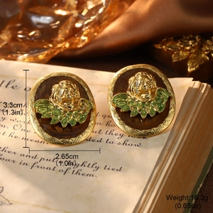Vintage style angel relief earrings with golden metal frame and brown marble texture