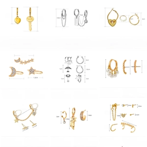 Detail showing assorted alloy ear cuff sets with heart, star, and moon shapes with zircons