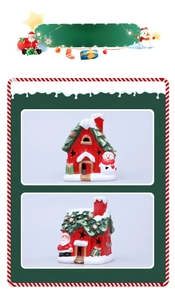 Detail of Christmas ceramic snow house with star cutouts and festive LED light decor