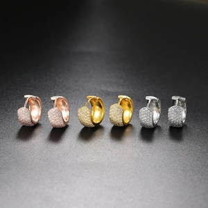 Three pairs of micro-pave zircon hoop earrings in gold, silver, and rose gold finishes