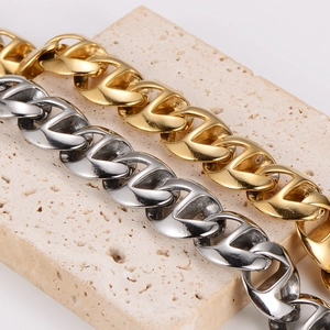 Classic stainless steel woven chain bracelets in gold and silver on natural stone