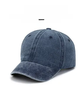 Close-up of deep blue washed cotton baseball cap texture with breathable eyelets