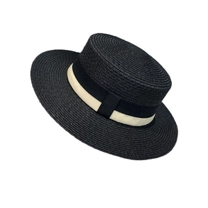 French style flat top boater hat with black and cream ribbon trim for beach vacations