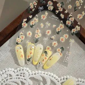 Floral nail art stickers TL-421 with yellow flowers, white bows and 3D relief pearl details