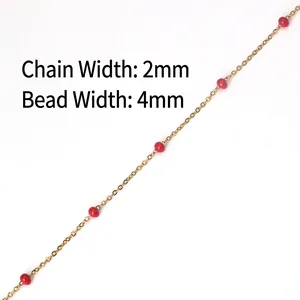 Detail view of 2mm gold stainless steel chain with 4mm red beads for DIY jewelry