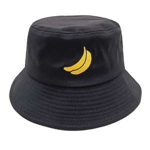 Close-up of yellow banana embroidery on a high-quality black cotton canvas bucket hat
